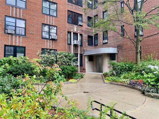 view of building exterior with cooling unit