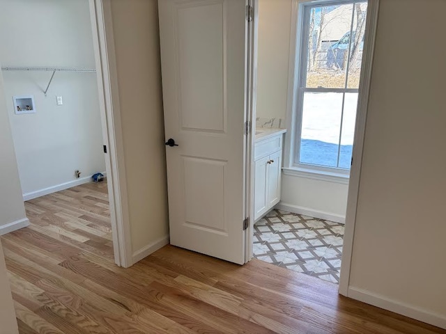 bathroom with wood-type flooring