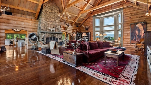 living room with rustic walls, high vaulted ceiling, and a wealth of natural light