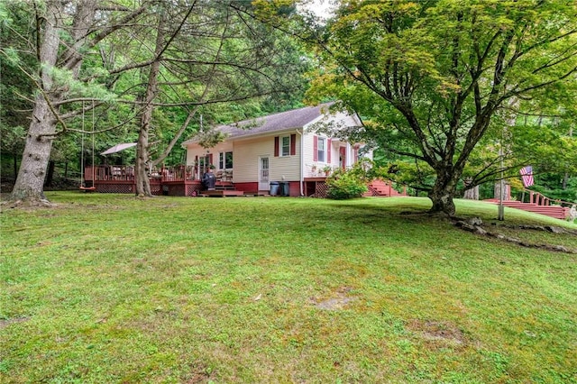 view of yard with a wooden deck