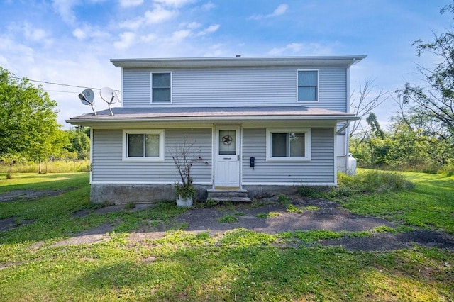 front of property with a front yard