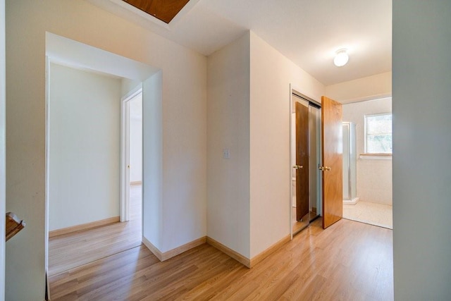 hall featuring light wood-type flooring