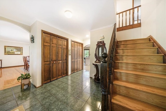 foyer entrance with crown molding