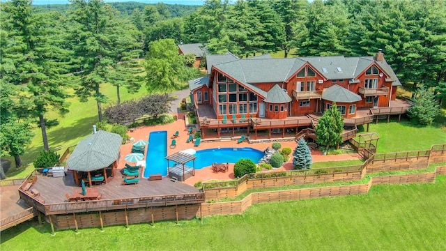 view of pool featuring a wooden deck