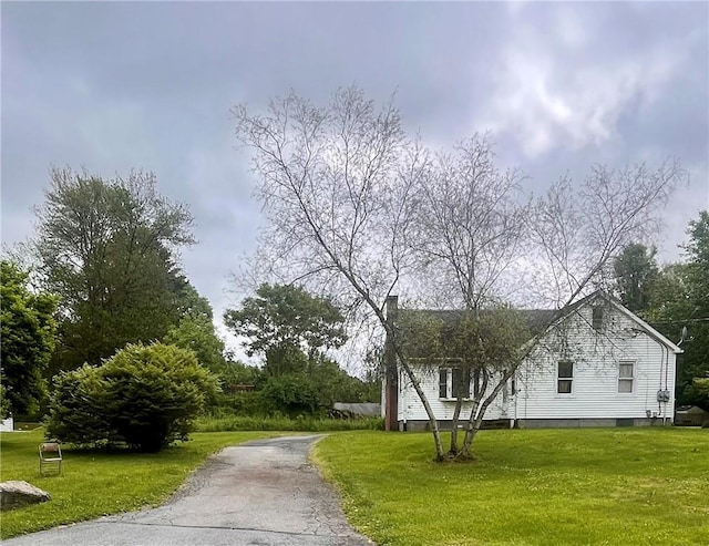 exterior space with a lawn