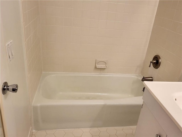 bathroom with tile patterned flooring and vanity