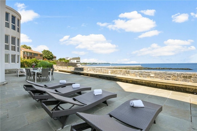 view of patio / terrace featuring a water view