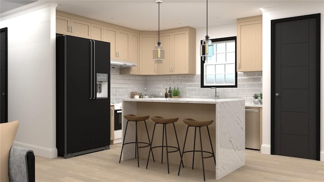 kitchen featuring black refrigerator with ice dispenser, light brown cabinets, a kitchen island, and light hardwood / wood-style floors