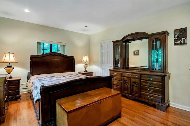 bedroom featuring light hardwood / wood-style floors