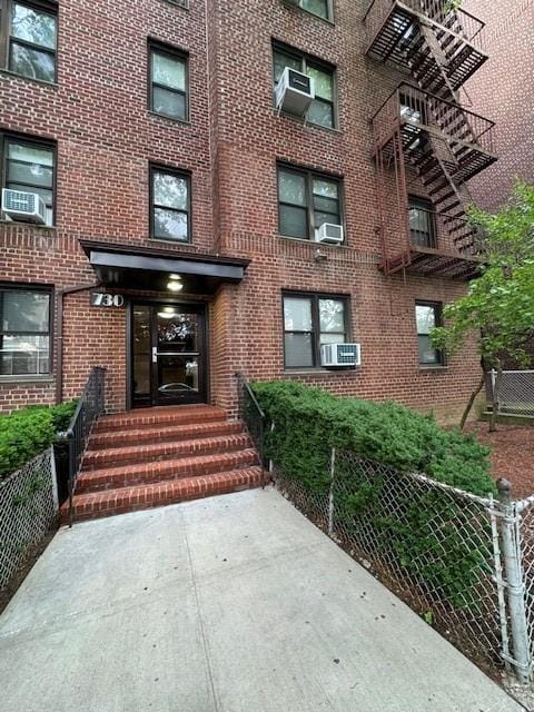 property entrance featuring cooling unit