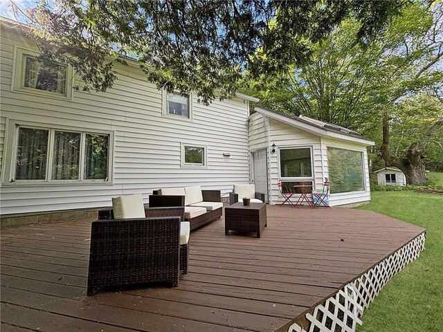 wooden terrace featuring an outdoor living space