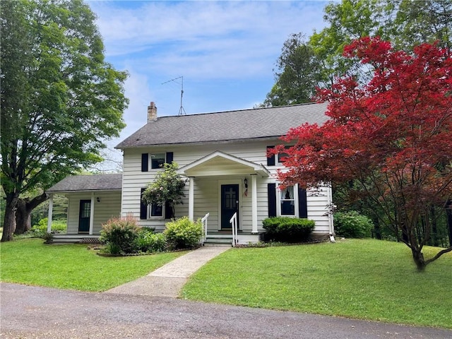 view of front of home with a front yard