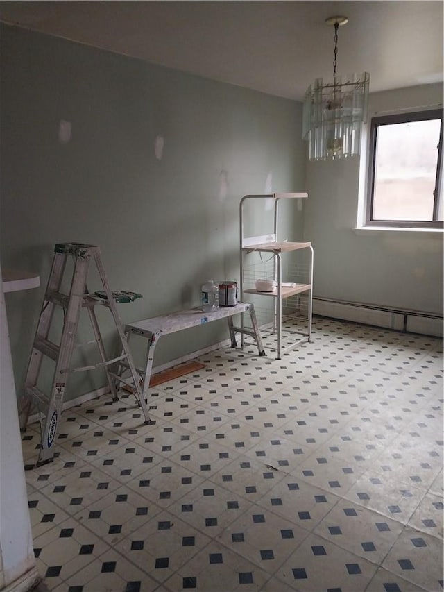 unfurnished room featuring an inviting chandelier