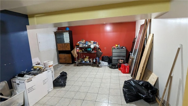 miscellaneous room with light tile patterned floors