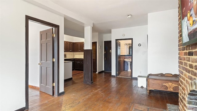 living room with dark hardwood / wood-style flooring