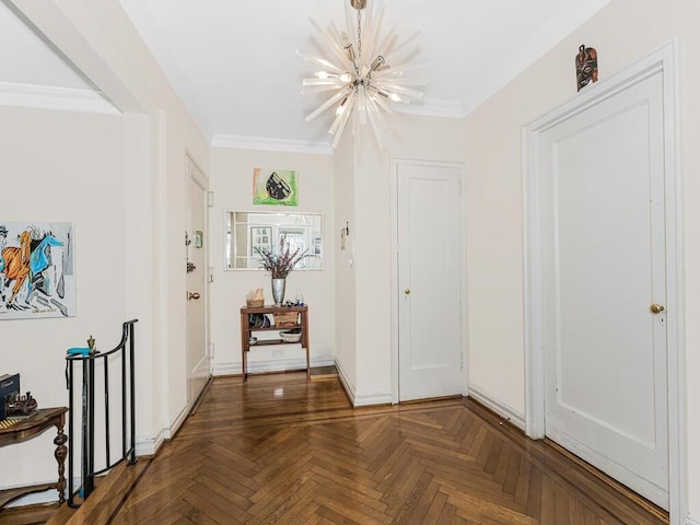 foyer with parquet floors, ornamental molding, and an inviting chandelier