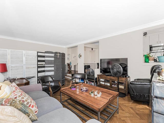 living room with light parquet floors and ornamental molding