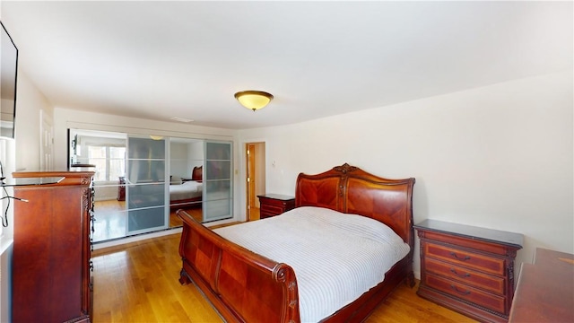 bedroom featuring hardwood / wood-style flooring