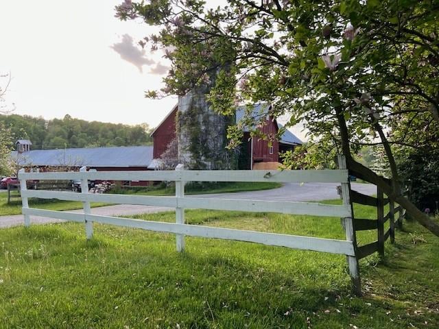 view of gate featuring a lawn