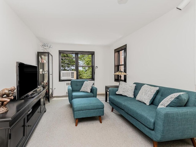 living room featuring cooling unit and light carpet