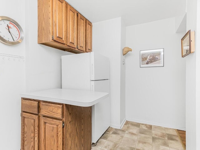 kitchen featuring white refrigerator