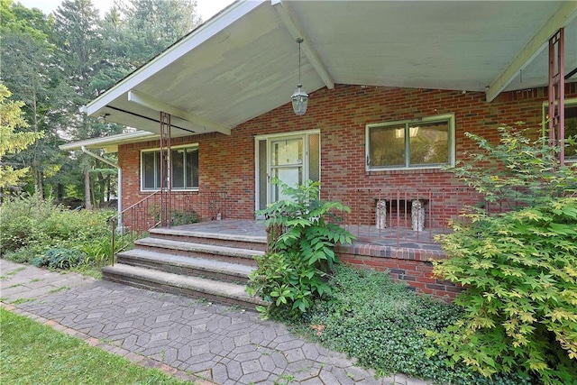 entrance to property with a porch