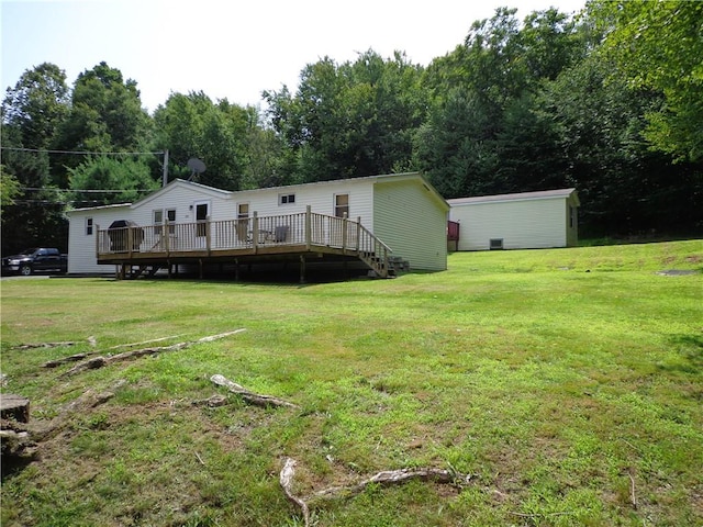 view of yard with a wooden deck