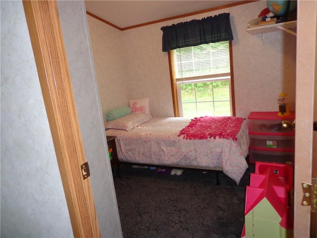 bedroom with crown molding