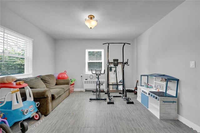 workout room featuring radiator heating unit