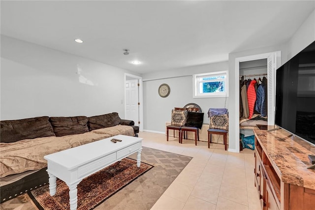 living room with light tile patterned floors