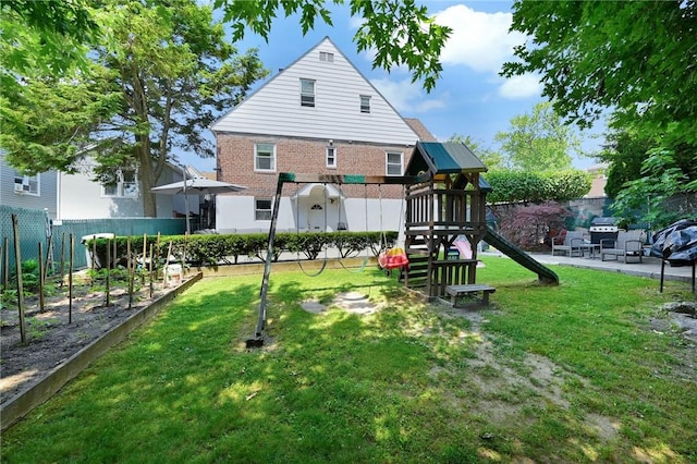 view of yard featuring a playground