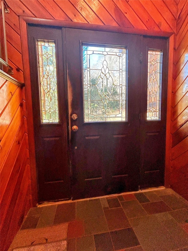 entrance foyer with wooden walls