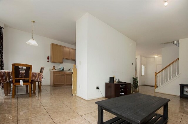 living room featuring light tile patterned flooring