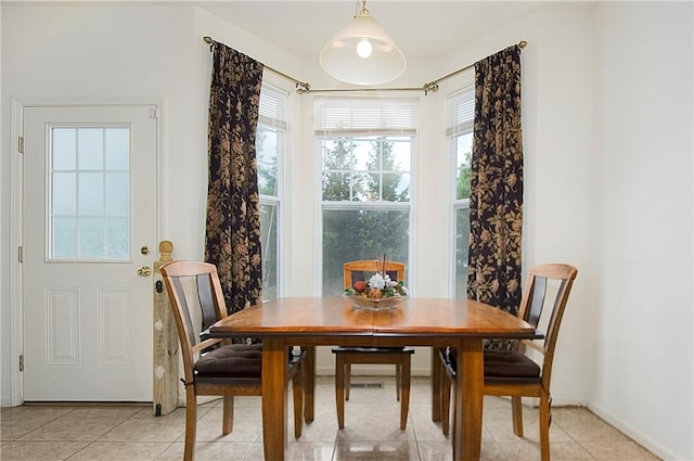 dining room with light tile patterned floors