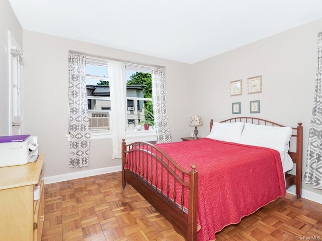 bedroom with parquet flooring