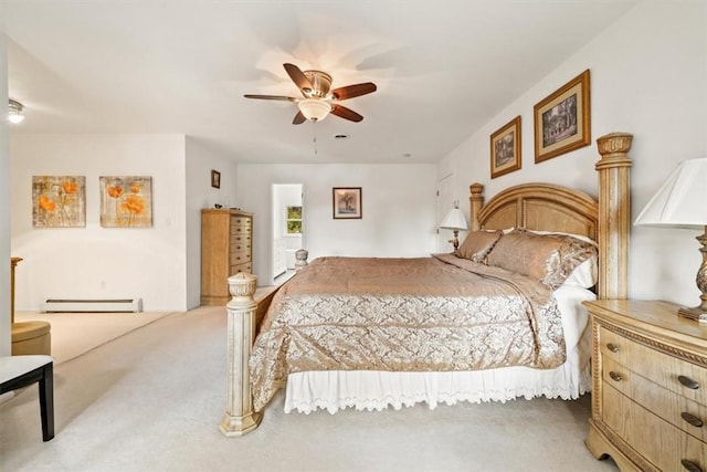 carpeted bedroom featuring ceiling fan and a baseboard radiator