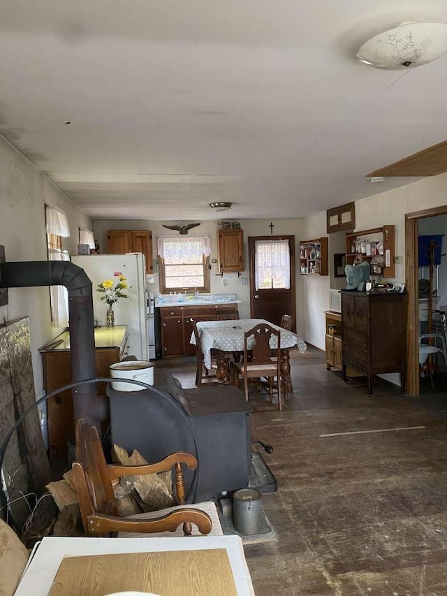 living room featuring a wood stove