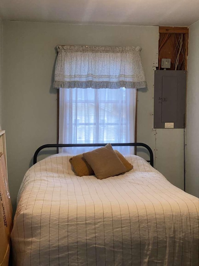 bedroom featuring electric panel