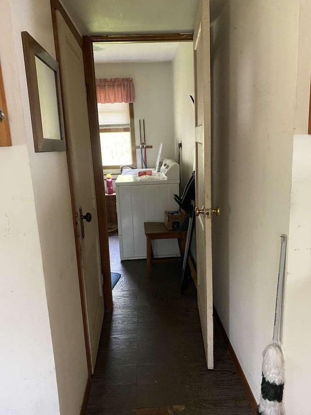 hall with washer / clothes dryer and dark wood-type flooring