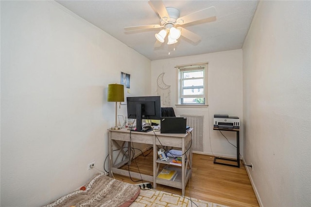 office area with ceiling fan and light wood-type flooring