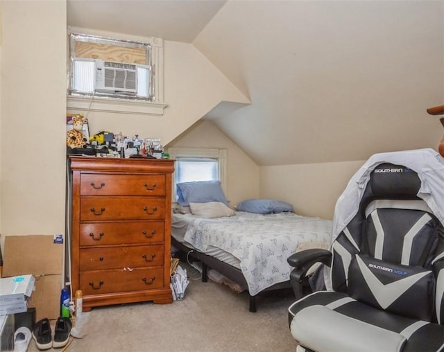 bedroom with light carpet and vaulted ceiling