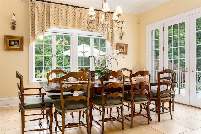 dining room with french doors, light tile patterned flooring, and a wealth of natural light