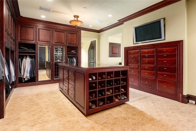 walk in closet with light carpet and visible vents