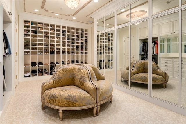 sitting room featuring recessed lighting, carpet flooring, and crown molding