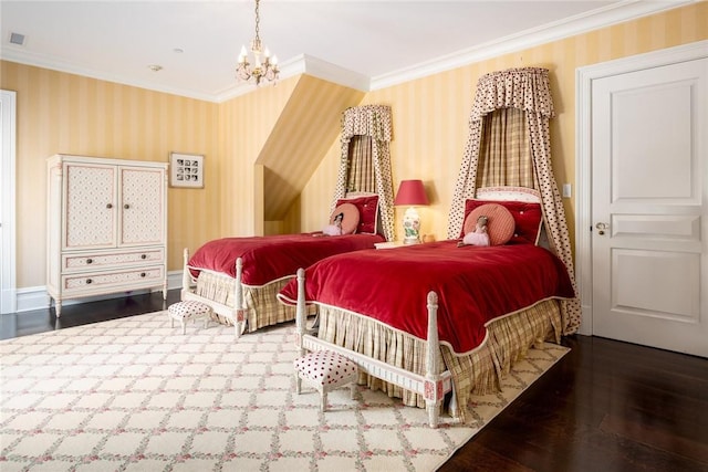 bedroom featuring wallpapered walls, hardwood / wood-style flooring, ornamental molding, and a chandelier