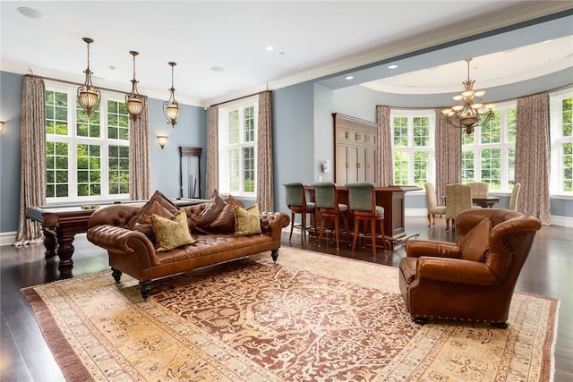 living area with crown molding, recessed lighting, a chandelier, wood finished floors, and baseboards