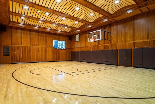 view of sport court with basketball hoop