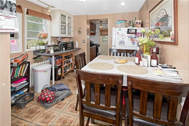 view of tiled dining space