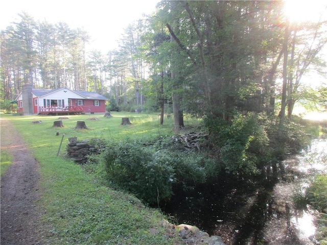 view of yard with a deck