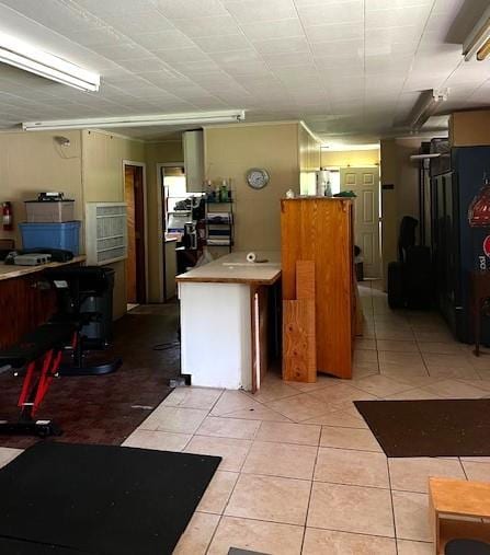 1124 State Route 42, Sparrowbush, NY 12780 - kitchen with light tile patterned floors and light countertops